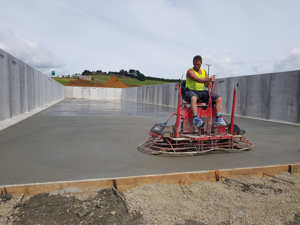 Man Buffing Commerical Building Concrete