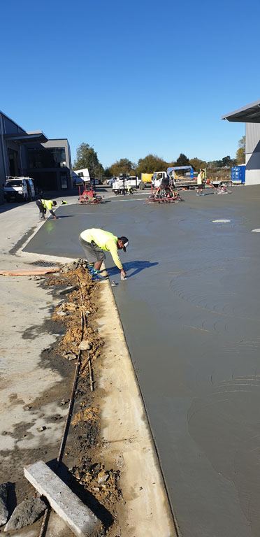 Man Paving New Concrete