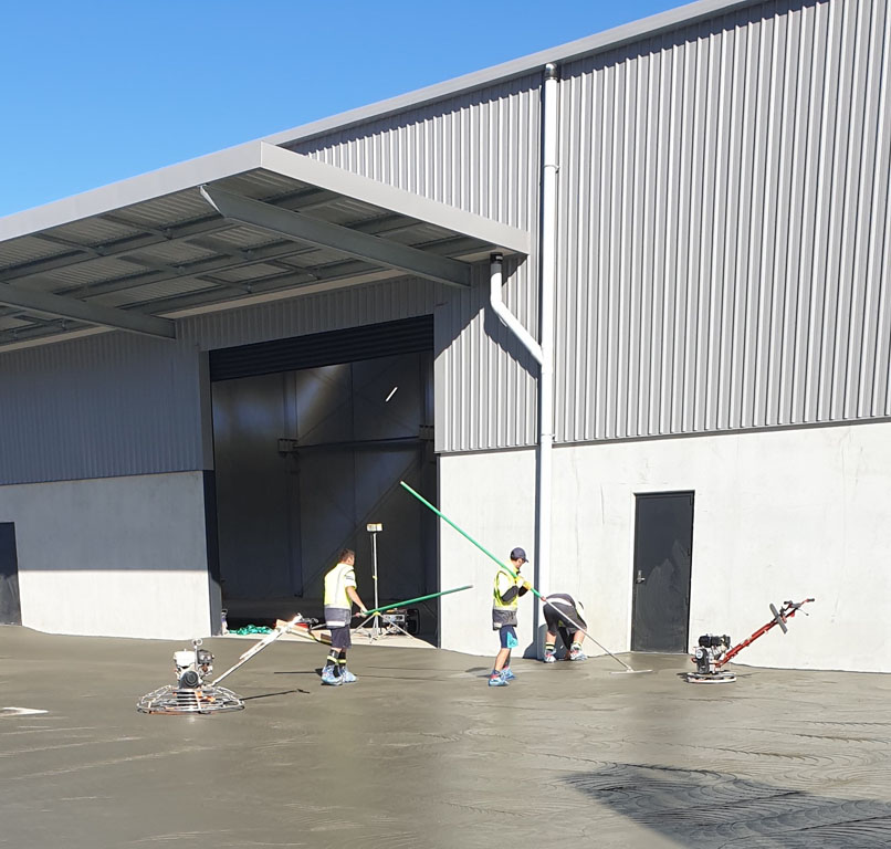 Men Proofing Concrete After Laying