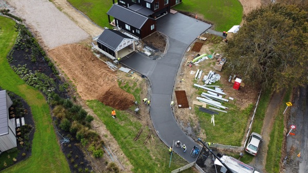 Liquorice Oxide trowel/broom finish driveway