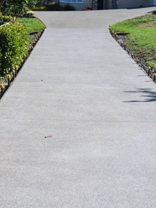 Exposed concrete Greymouth pebble with 5kg black oxide